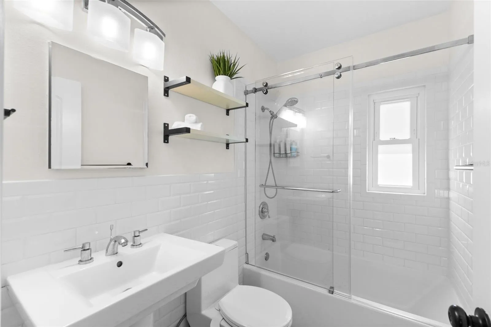 Second/Hall Bathroom with hexagon tile floors