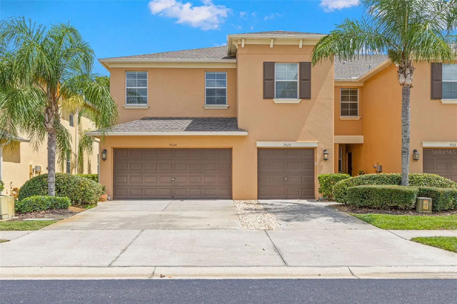 9524 Trumpet Vine Loop, a 3-bedroom, 2.5-bath townhome with more than 2,000 square feet and a true two-car garage.