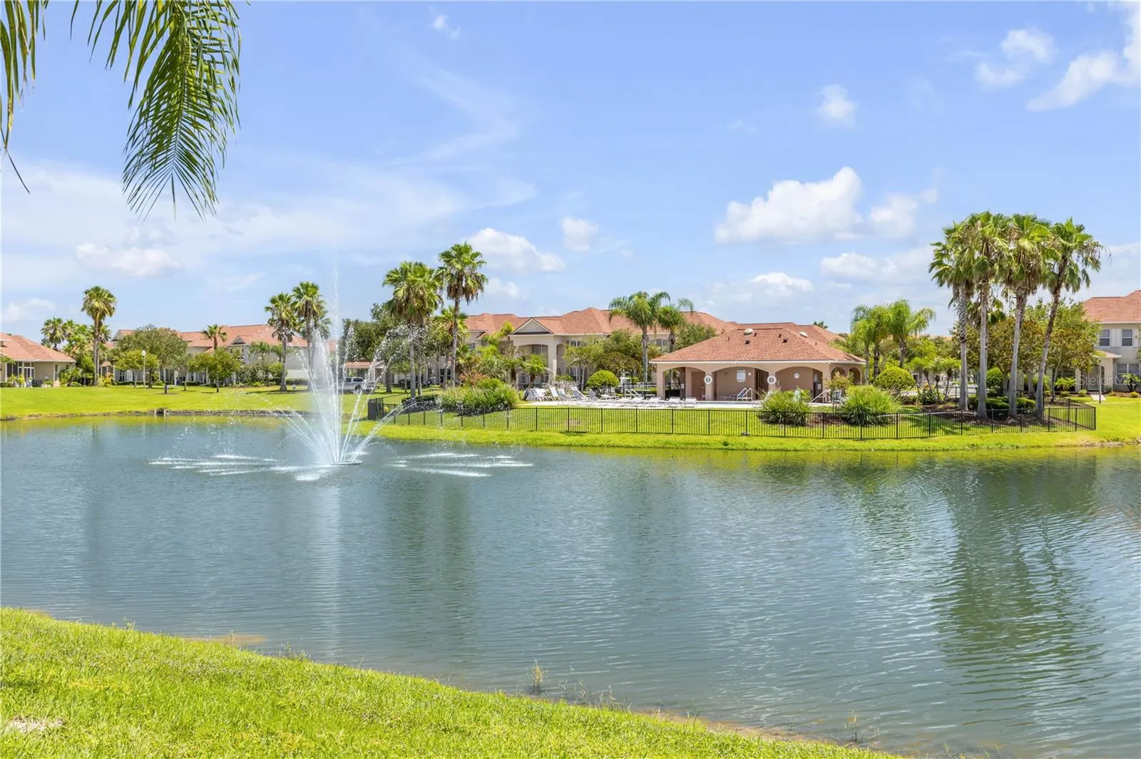 View of pond with fountain from back patio