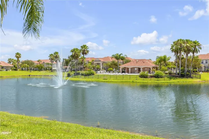 View of pond with fountain from back patio