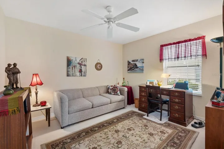 Third bedroom with oversized walk-in closet, currently used as a den.