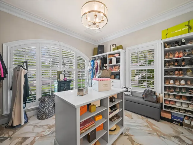 BONUS Third Primary walk in closet with island and dressing area