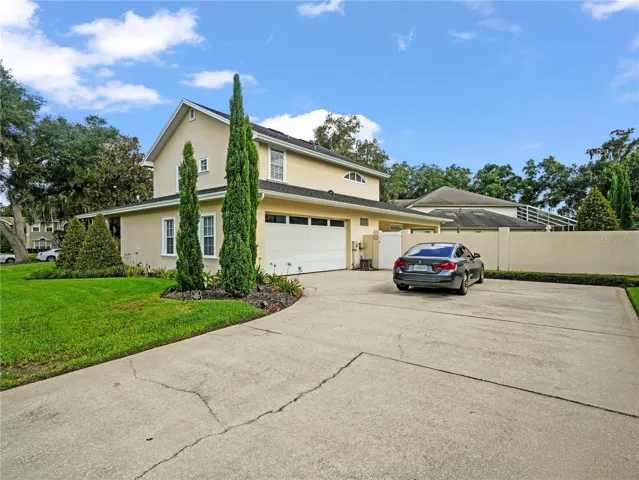 Rear entry Garage with extra parking pad