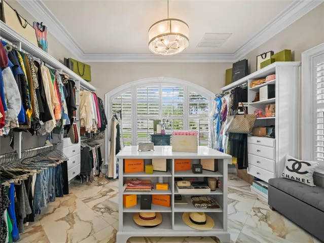 BONUS Third Primary walk in closet with island and dressing area