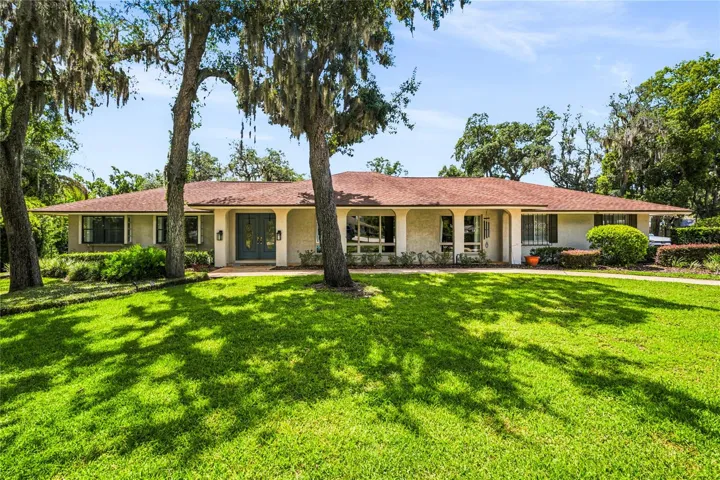 This 6-bedroom home is situated on approximately three-quarters of an acre at the end of a cul-de sac in  desirable Spring Valley