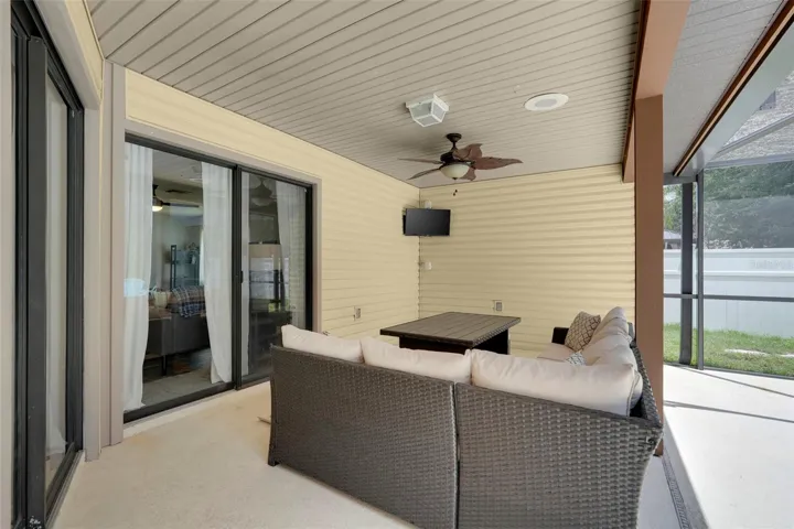 Covered patio with sliding doors coming off the family room and dinette area off kitchen