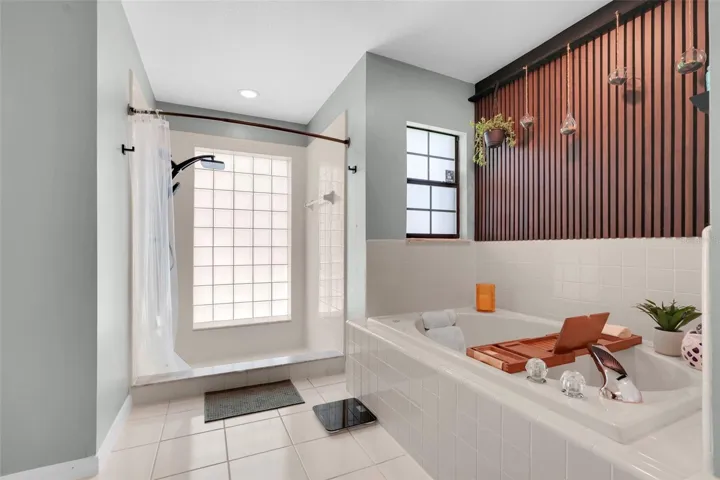 Ensuite bathroom with soaking tub and separate shower