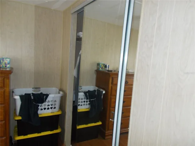 Primary Bedroom Mirrored Double Closet