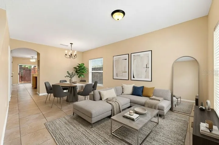 Open living and dining. Virtually Staged.