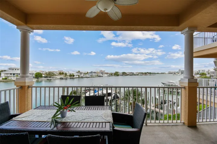 Generous patio spans the main living areas and primary bedroom