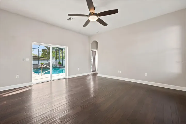 Family Room Overlooks Pool and open to Kitchen