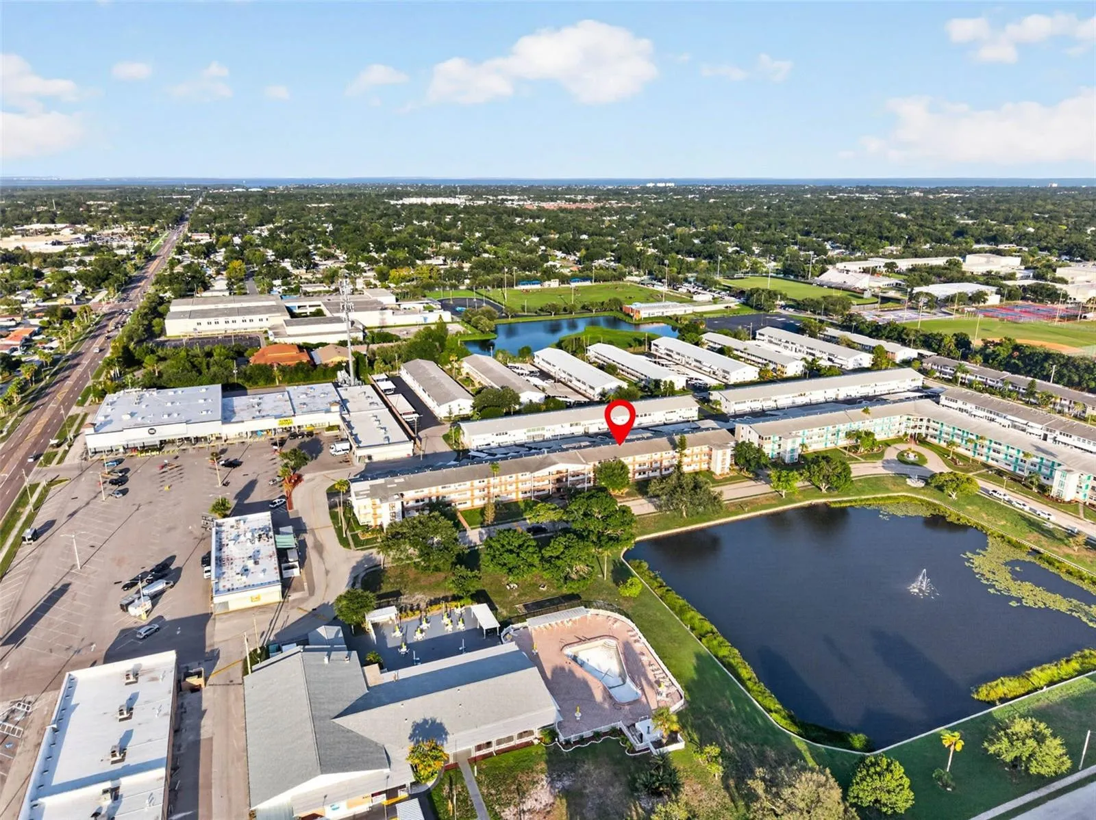 Aerial view highlighting the building's prime location within the community.
