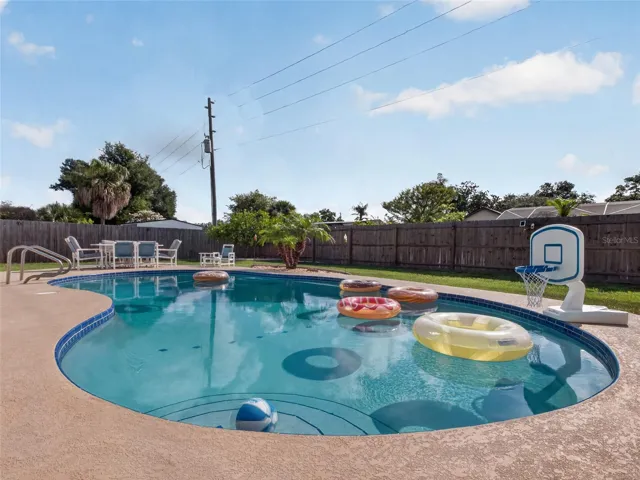 Pool Features Walk-in Steps and a Climb-in Ladder