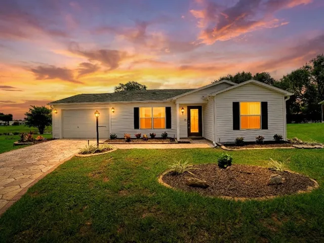 LOVELY UPGRADED 2/2 AUSTIN MODEL ON 1/3+ ACRE IN CUL-DE-SAC WITH WATER VIEW AND PRIVACY LOCATED IN THE VILLAGE OF ALHAMBRA.