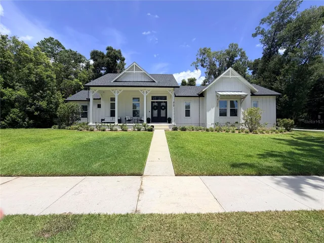 Custom-built modern farmhouse on a spacious 0.40-acre corner lot.
