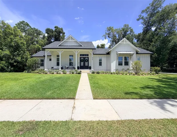 Custom-built modern farmhouse on a spacious 0.40-acre corner lot.