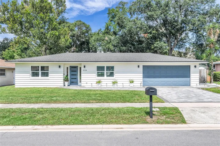 Beautifully renovated POOL home with attached 2 car garage