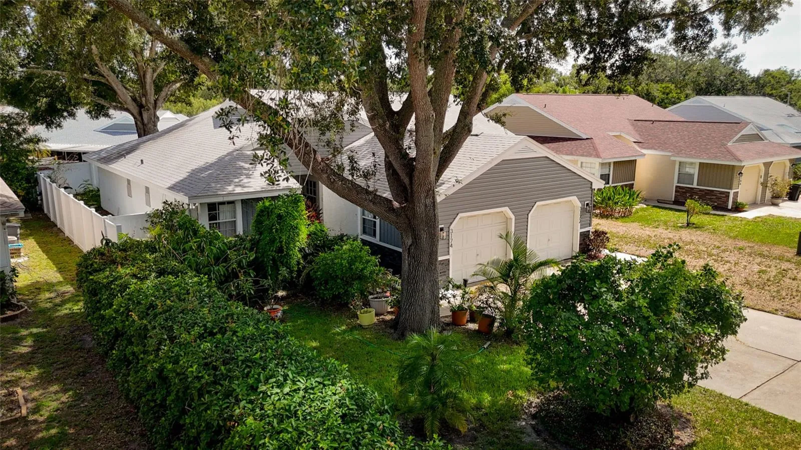 Mature Landscaping, Newer vinyl fence
