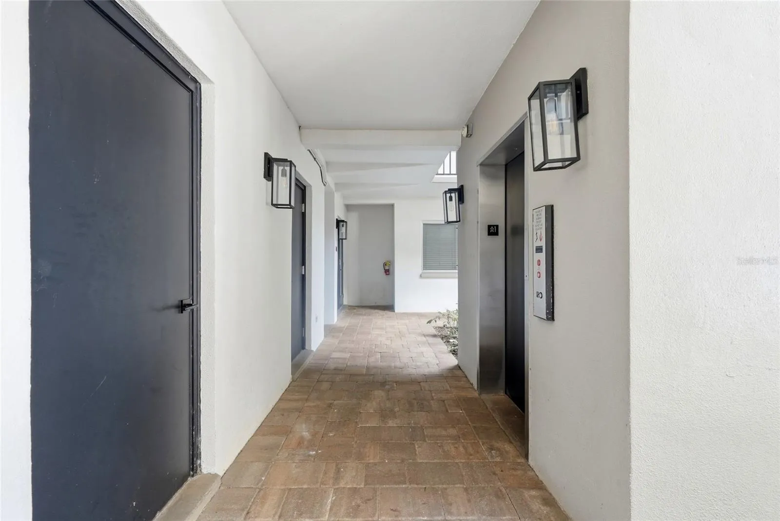 Storage area is across from the elevator