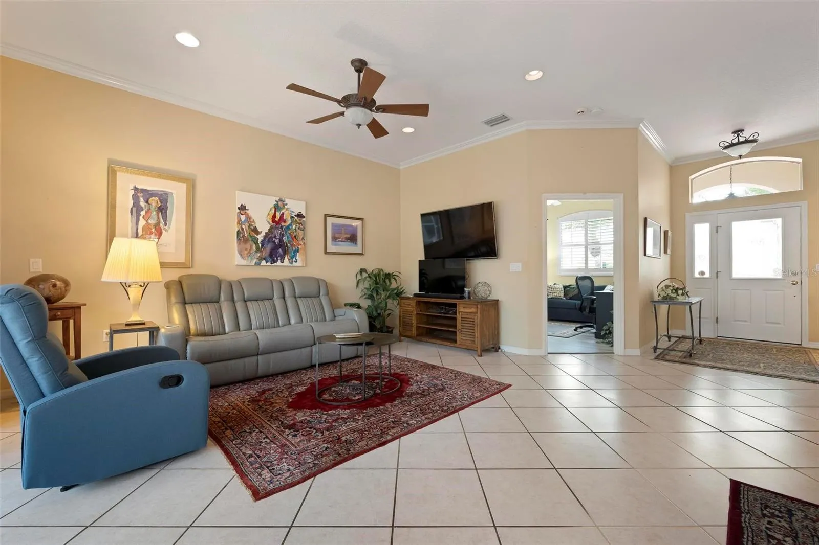 Living room looking back at entrance hall and office