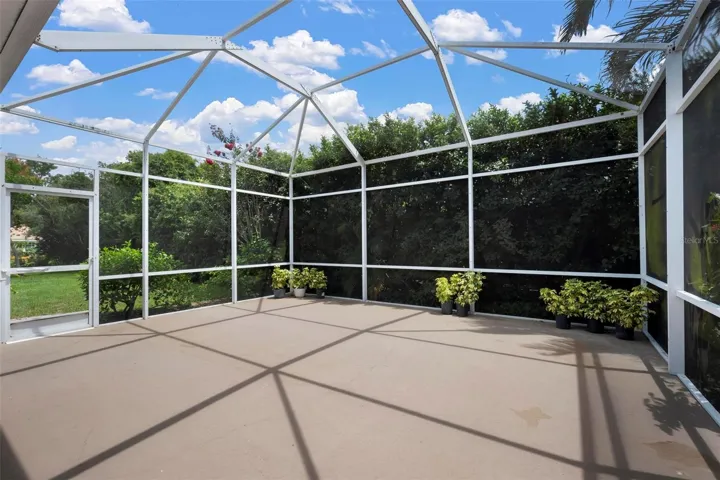 Large screened-in lanai looking left