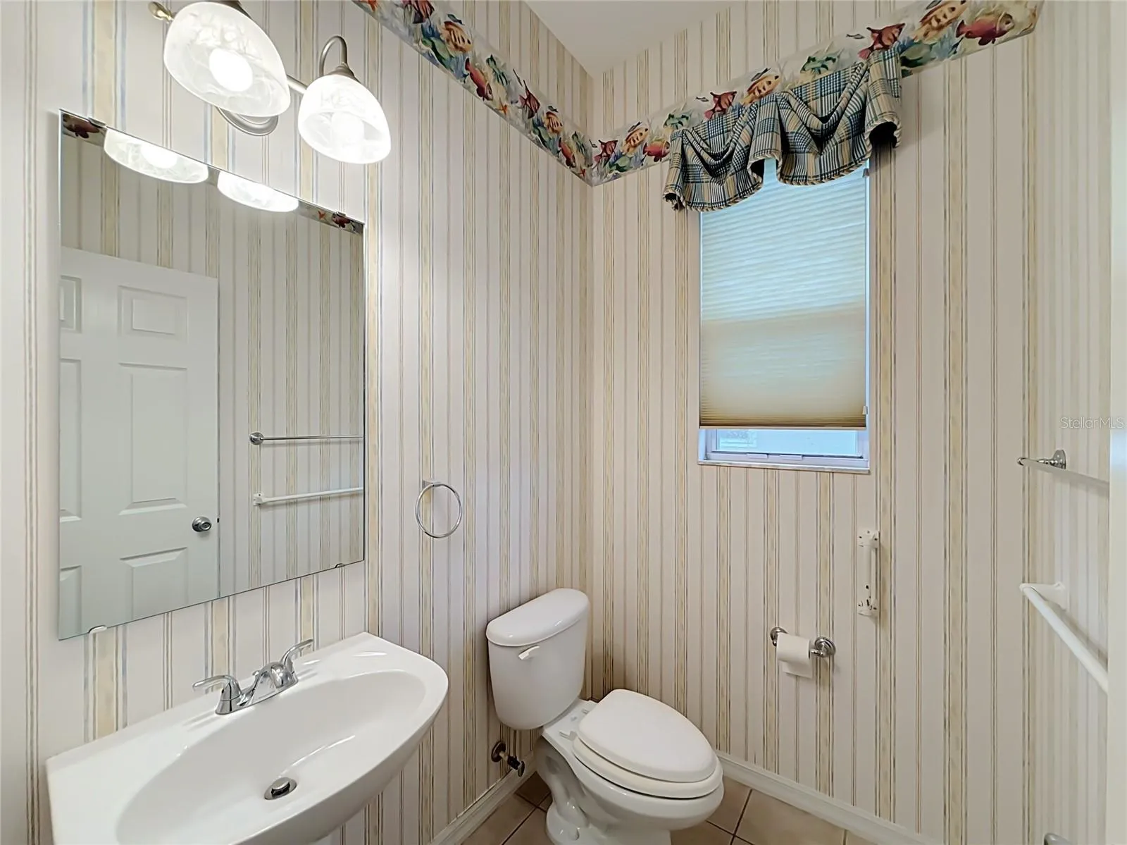 Powder Rm or 1/2 Ba. Wall paper can easily be removed and walls painted.