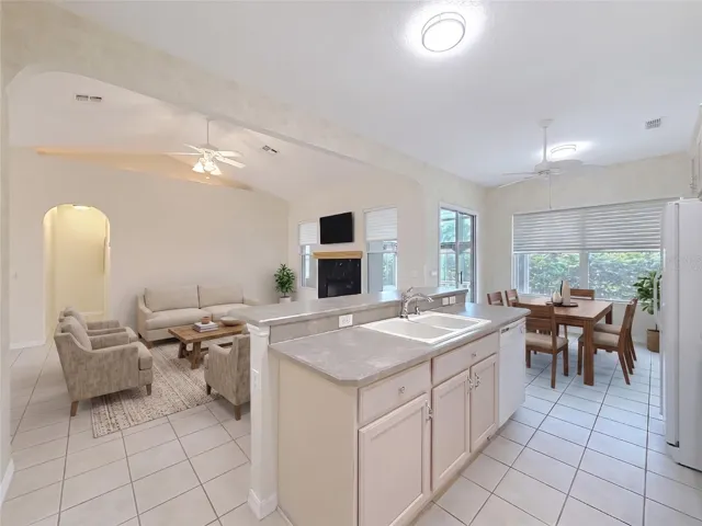 Kitchen, Family room and dinette. Virtually Staged