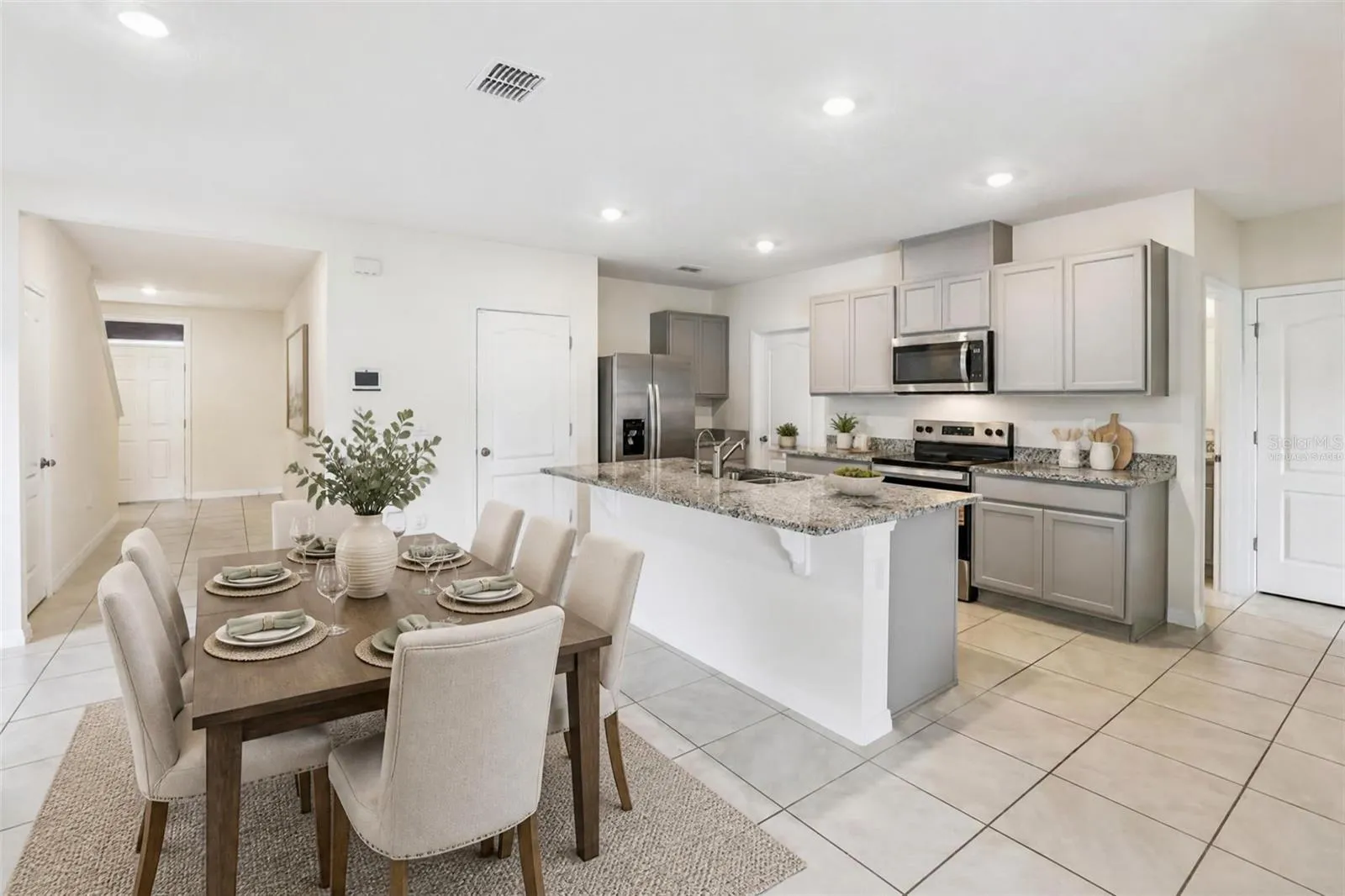 Virtually staged dining kitchen combo