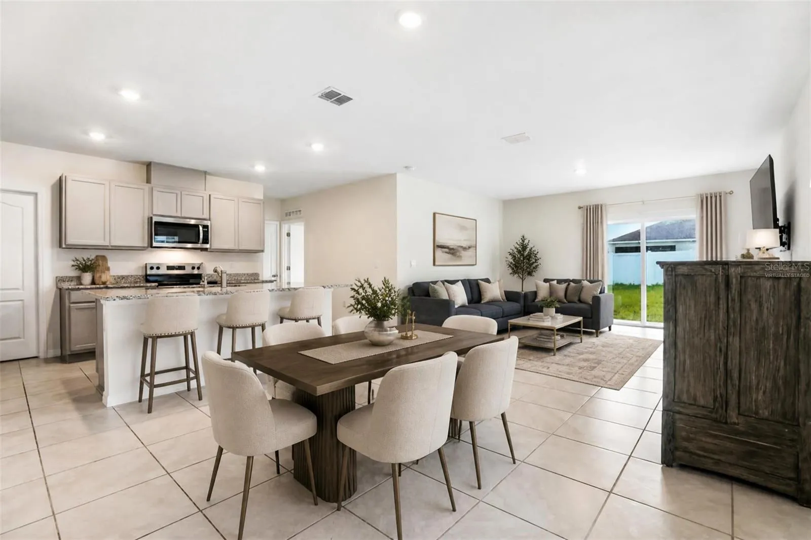 virtually staged dining kitchen living room combo