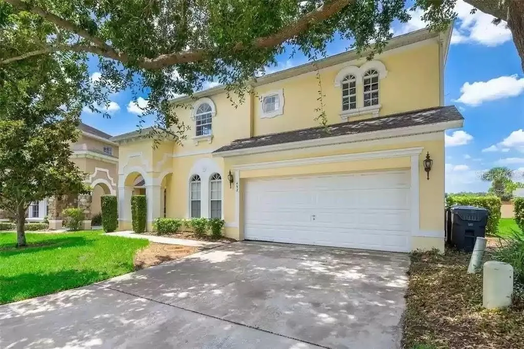 Spacious driveway and Two car garage.