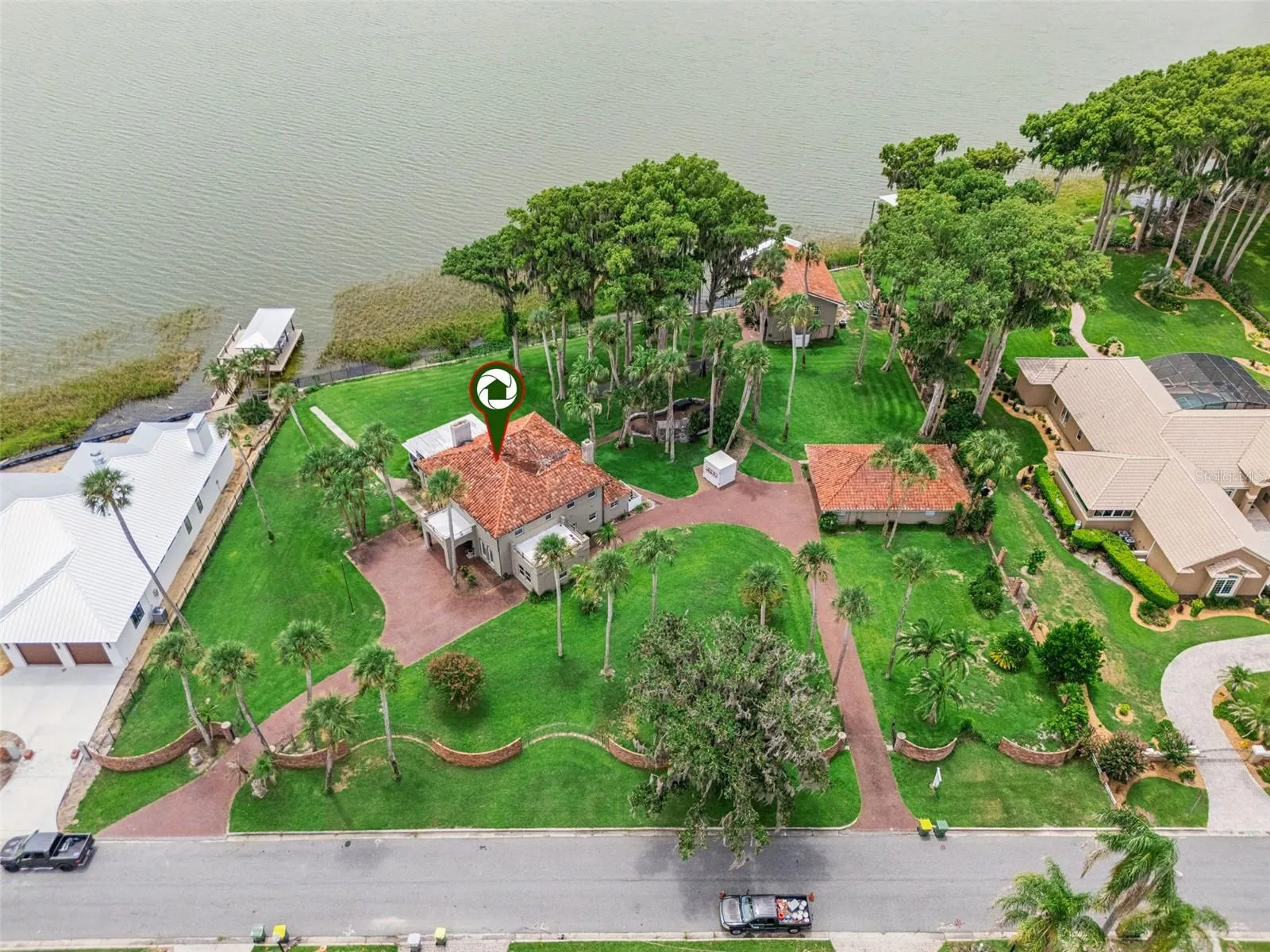 Bird's-eye view showing the full lot footprint and proximity to the water