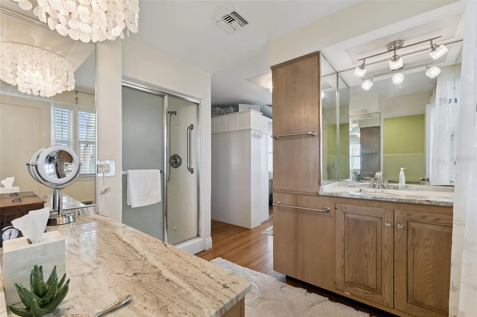 Spacious walk-in shower with modern finishes