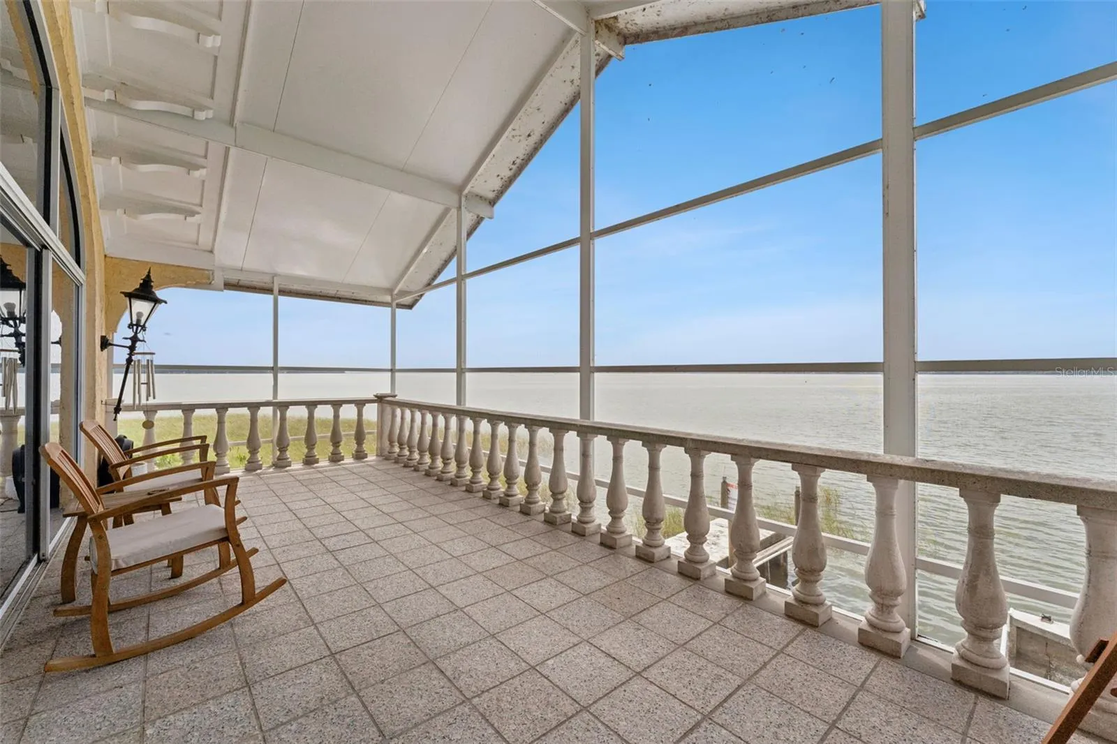 Relax and take in the panoramic sunsets from this breezy upper porch