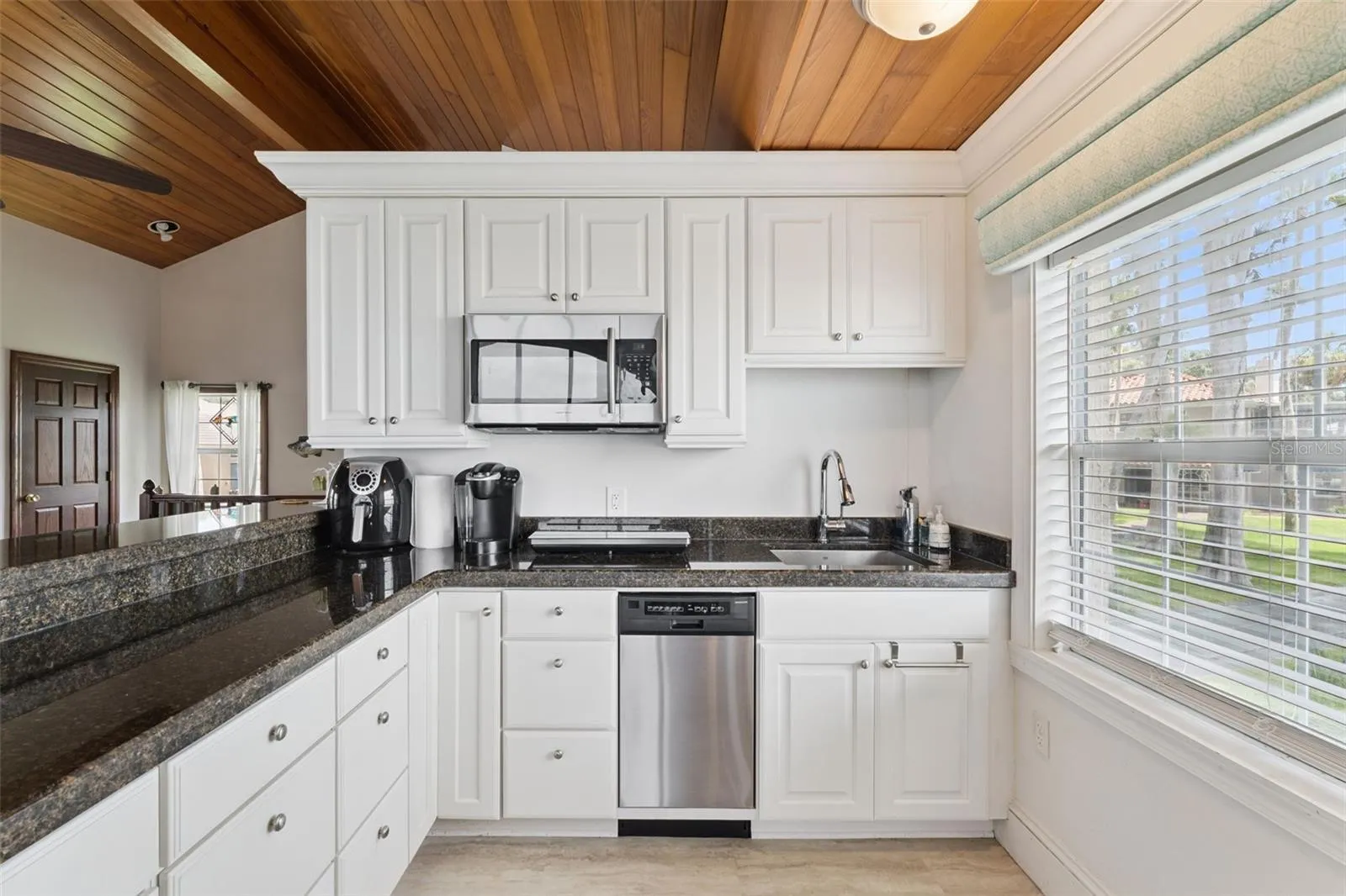 Bright and functional layout with stainless appliances and ample counter space