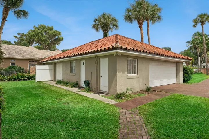 Detached garage and rear elevation with direct lake access