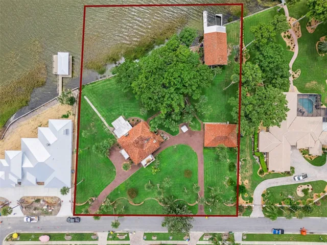 Property boundary outlined, showcasing the generous waterfront parce