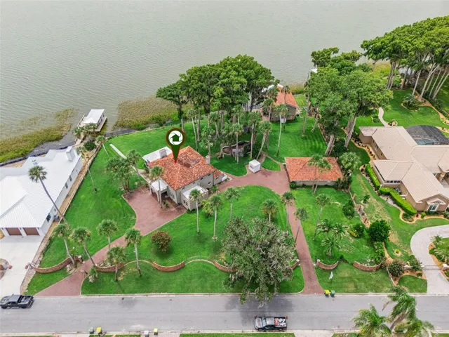 Bird's-eye view showing the full lot footprint and proximity to the water