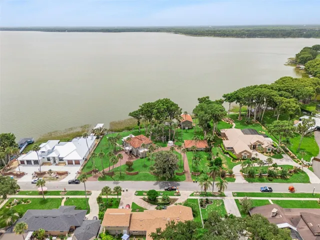 Elevated perspective of the estate and its direct lakefront position