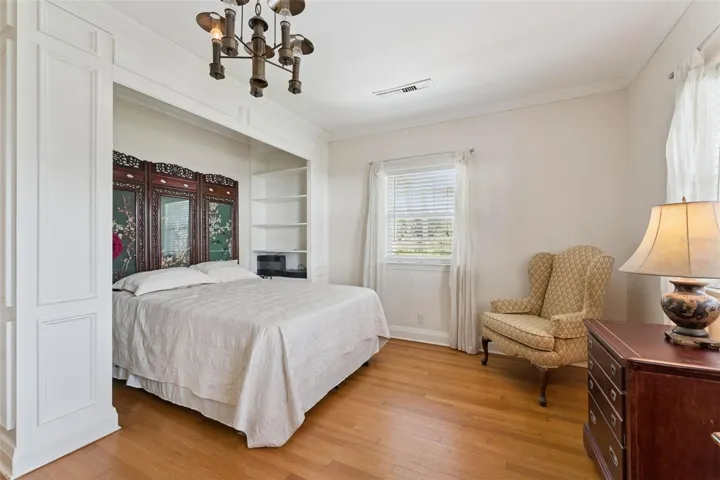 Upper-level bonus room with built-in display shelving