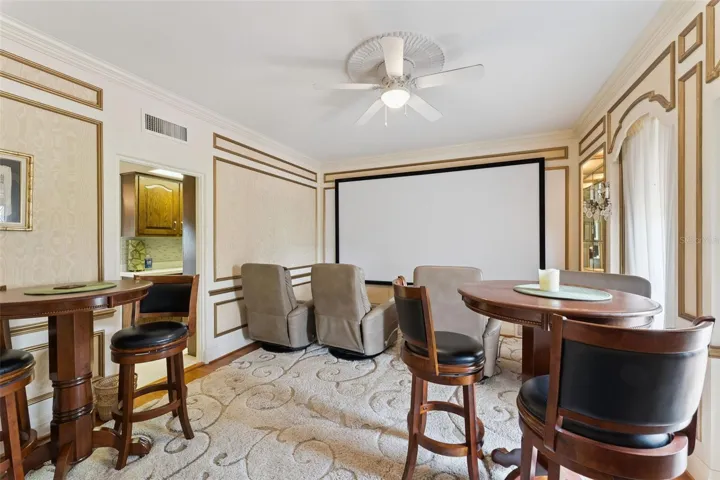 Entertaining nook with rich wood paneling, perfect for game day or cocktails