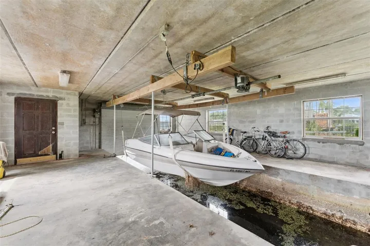 Covered boat storage with direct lake access, no trailer needed