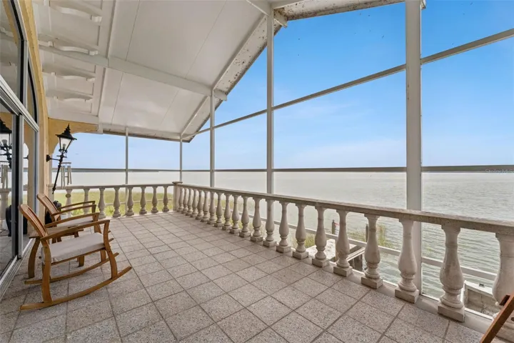 Relax and take in the panoramic sunsets from this breezy upper porch