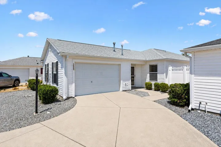 Front view, driveway and 1-1/2 garage, no grass!