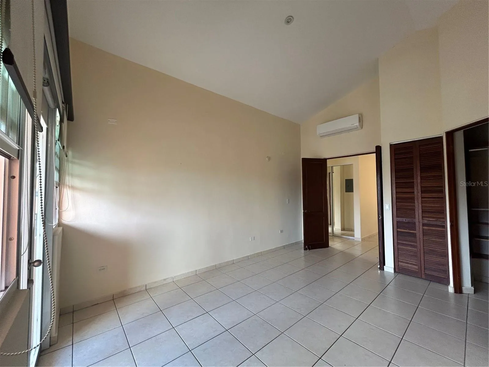 High Ceiling Primary Bedroom