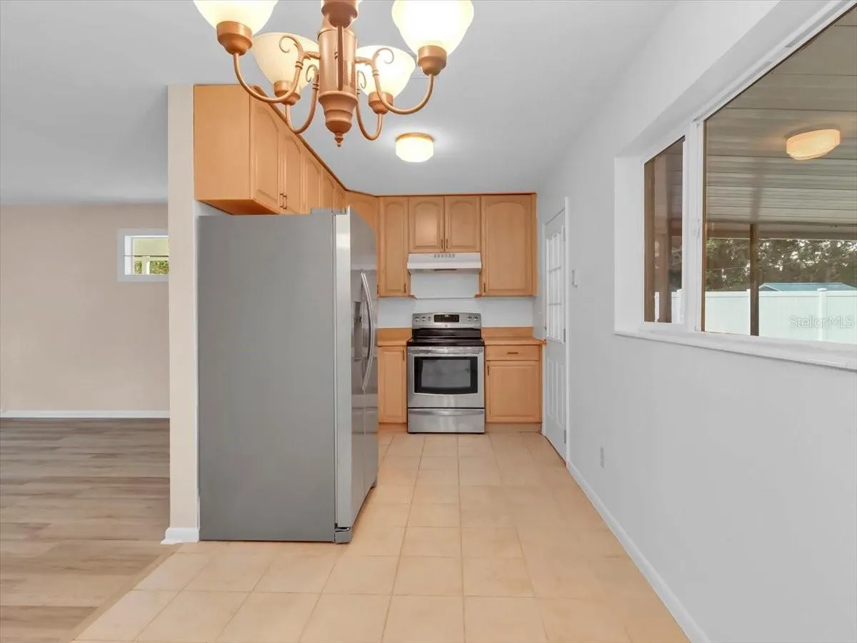 Kitchen - Has a big Picture window and an Eat-In Dining space!