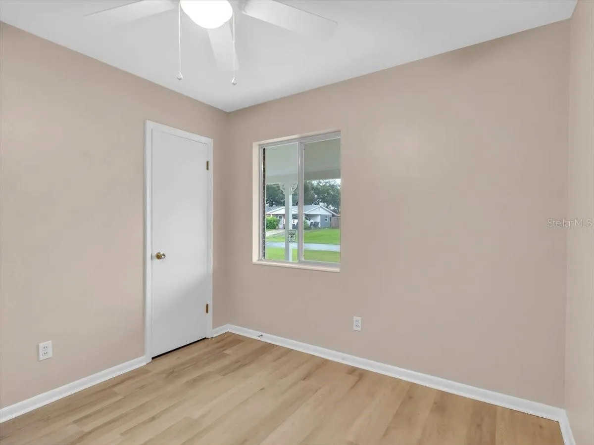 Bedroom 1 Updated flooring, Paint &amp;  Ceiling fan
