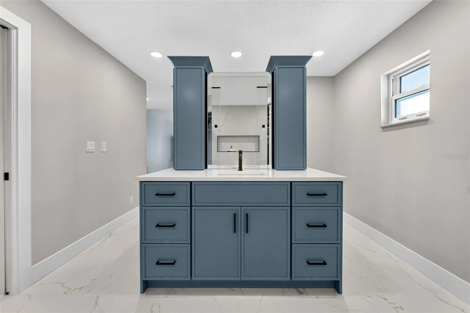 Beautiful primary bathroom dual vanity with abundant storage.