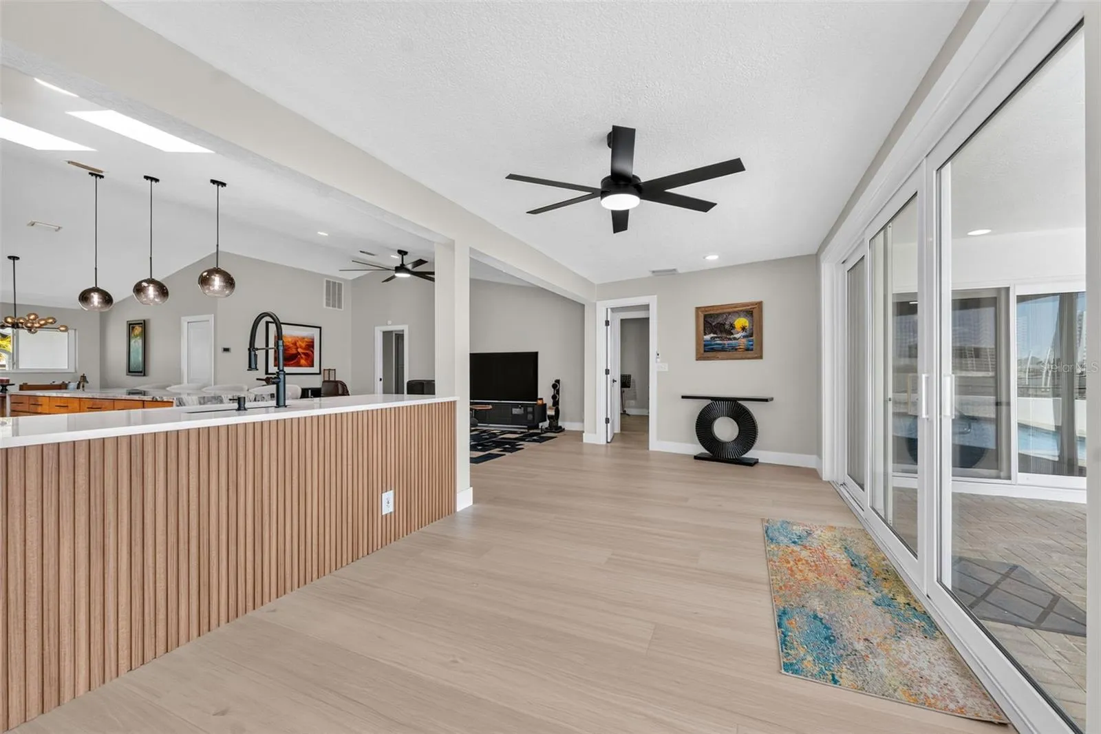 Bonus room with new ceiling fan offering flexible options for its use.
