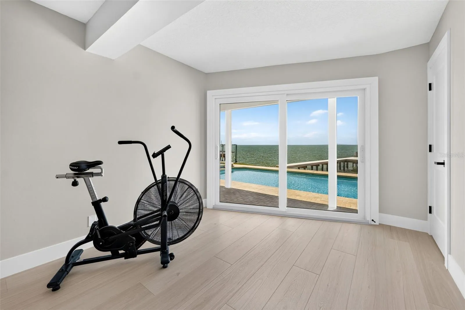 Versatile bonus space in the primary bedroom, perfect for a reading nook, workout area, or personalized retreat.