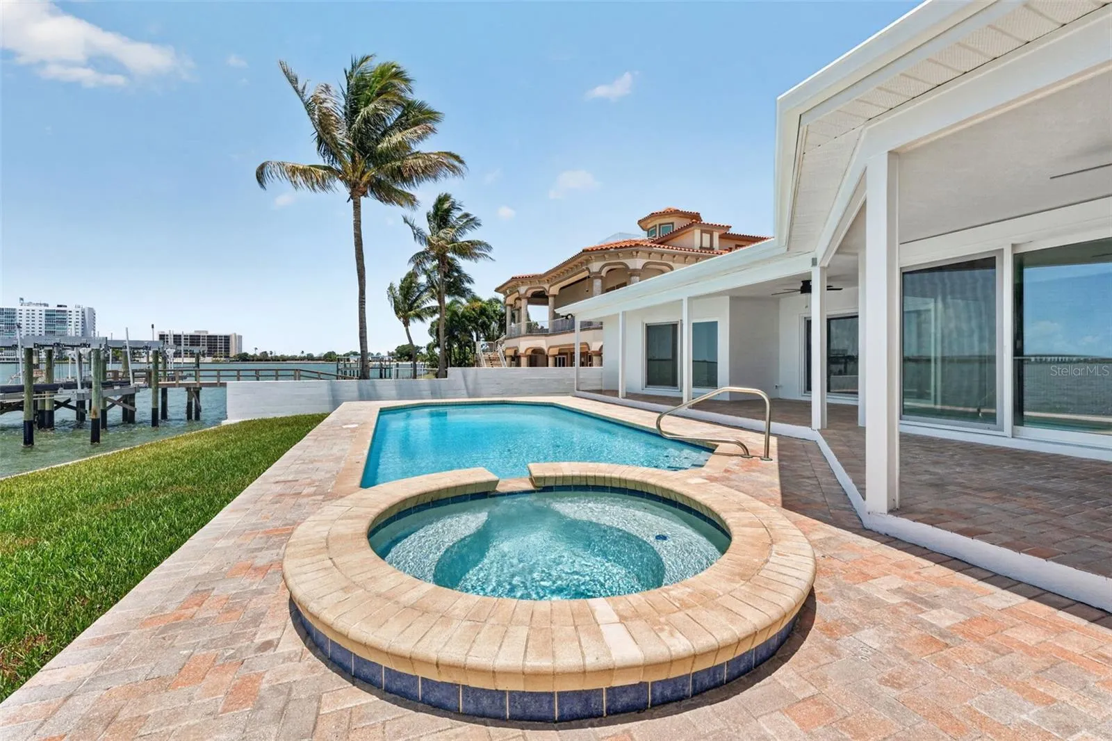 Pool with gas heated spillover spa
